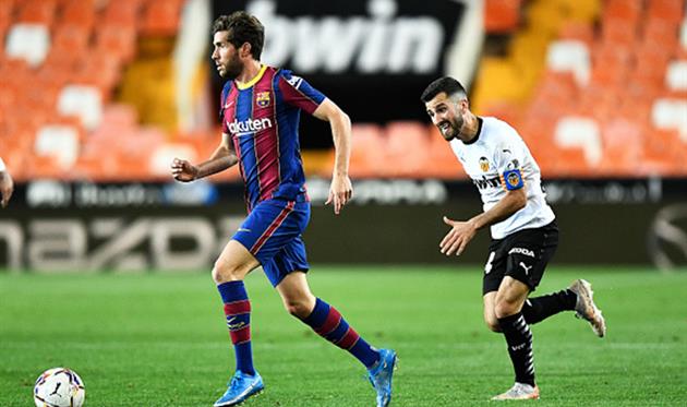 Серхи Роберто (слева), Getty Images