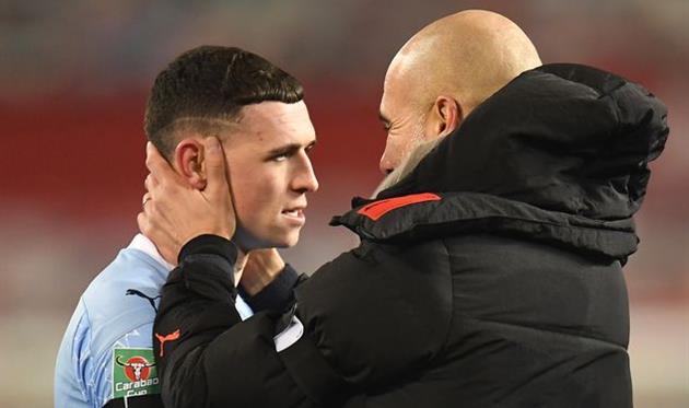 Фил Фоден (слева) и Хосеп Гвардиола, Getty Images