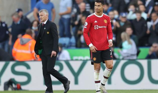 Оле-Гуннар Солскьяер (слева) и Криштиану Роналду, Getty Images