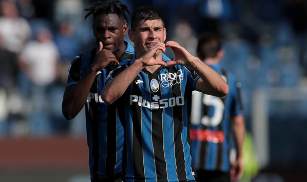 Руслан Малиновский и Дуван Сапата, Getty Images