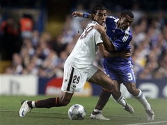 Шамах и Э.Коул, AP