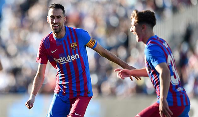 Серхио Бускетс (слева), Getty Images