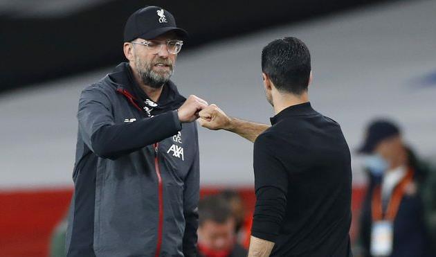 Юрген Клопп (лицом) и Микель Артета, Getty Images