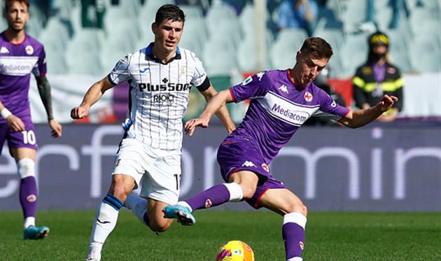 Руслан Малиновский (слева), Getty Images