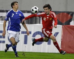 Юрий Жирков атакует, Reuters