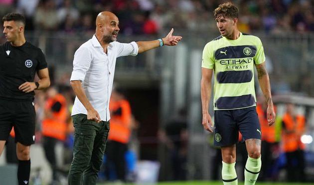 Хосеп Гвардіола та Джон Стоунз, Getty Images