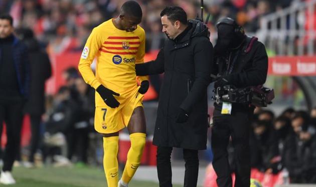 Усман Дембеле (ліворуч) та Хаві, Getty Images