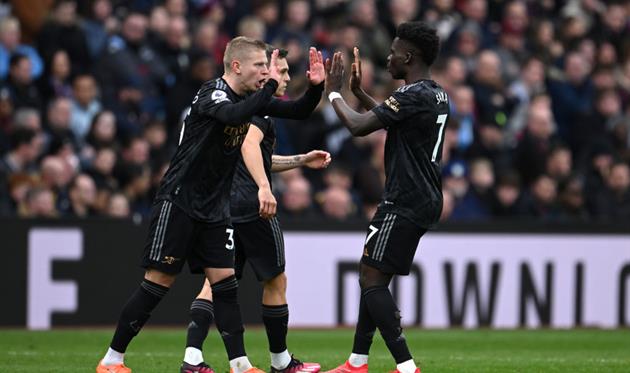 Олександр Зінченко та Букайо Сака, getty images