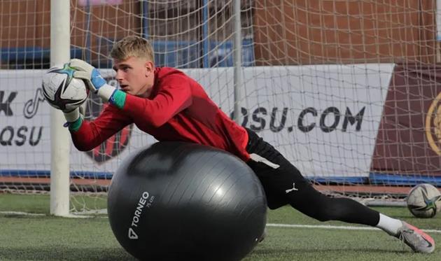 Євгеній Кучеренко, Аксу