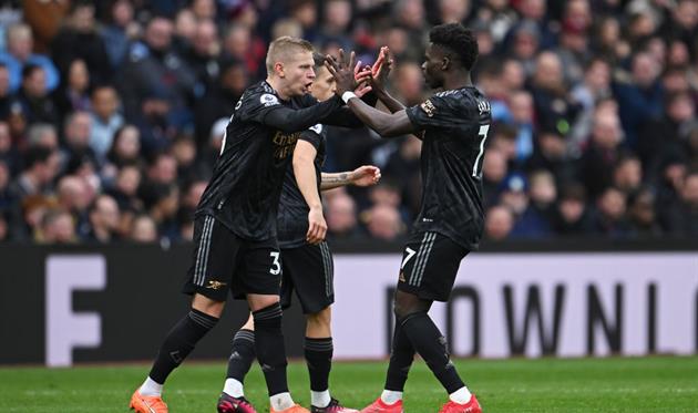 Олександр Зінченко та Букайо Сака, getty images