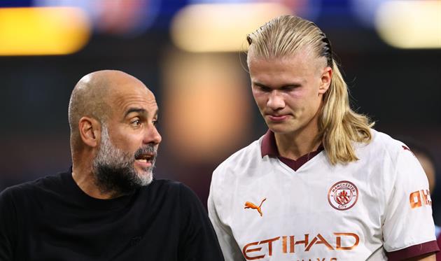Хосеп Гвардіола та Ерлінг Голанд, getty images