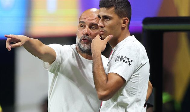 Josep Guardiola and Rodri, Getty Images