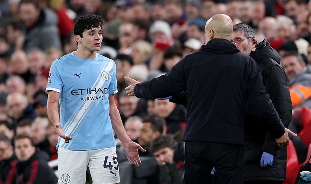 Абдукодір Хусанов та Пеп Гвардіола, Getty Images