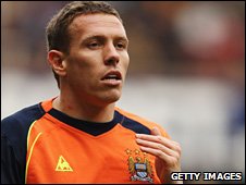 Крейг Беллами