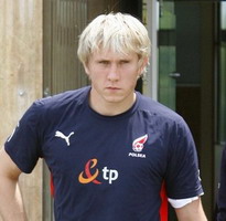 Томаш Кущак, АР