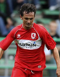 Тунджай Шанли