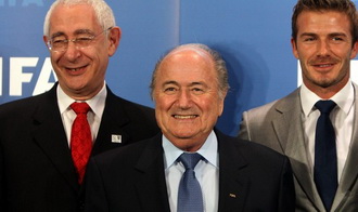 Тризман, Блаттер и Бекхэм, фото Reuters